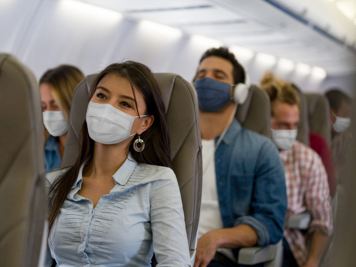 Don't Forget To Wear a Face Mask if You Fly Home for the Holidays